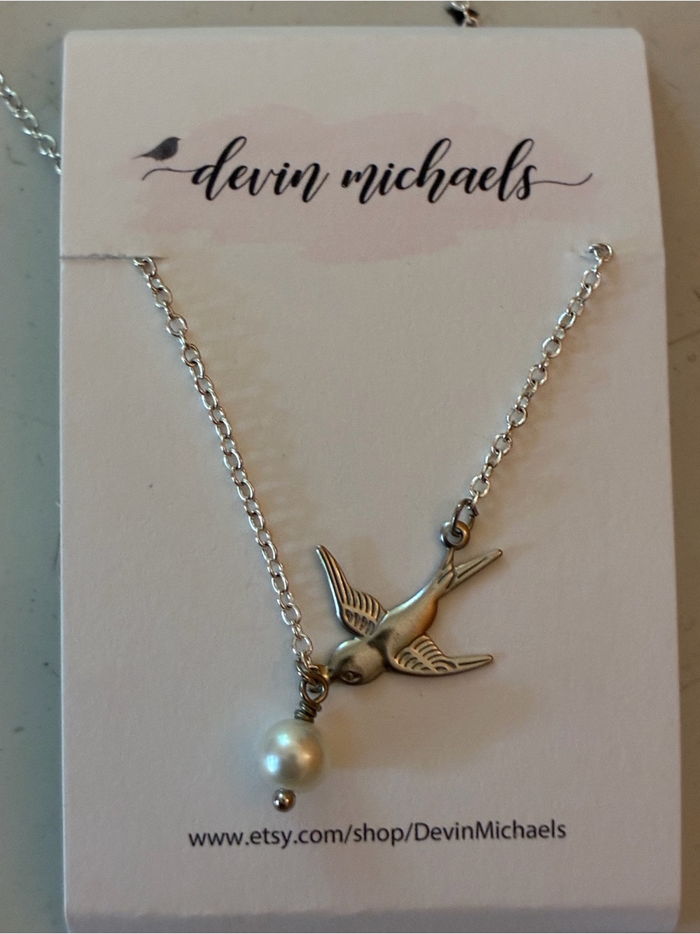 Silver Bird with pearl Necklace